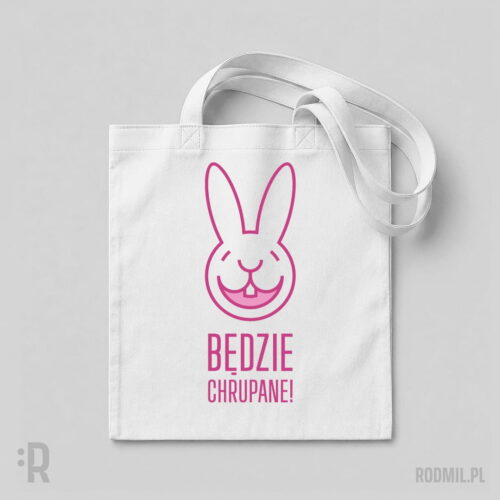 Będzie chrupane! - torba wegańska z nadrukiem Wegańska biała torba na ramię z nadrukiem projektu graficznego konturowego różowego pyszczka, uśmiechniętego królika i napisem BĘDZIE CHRUPANE!